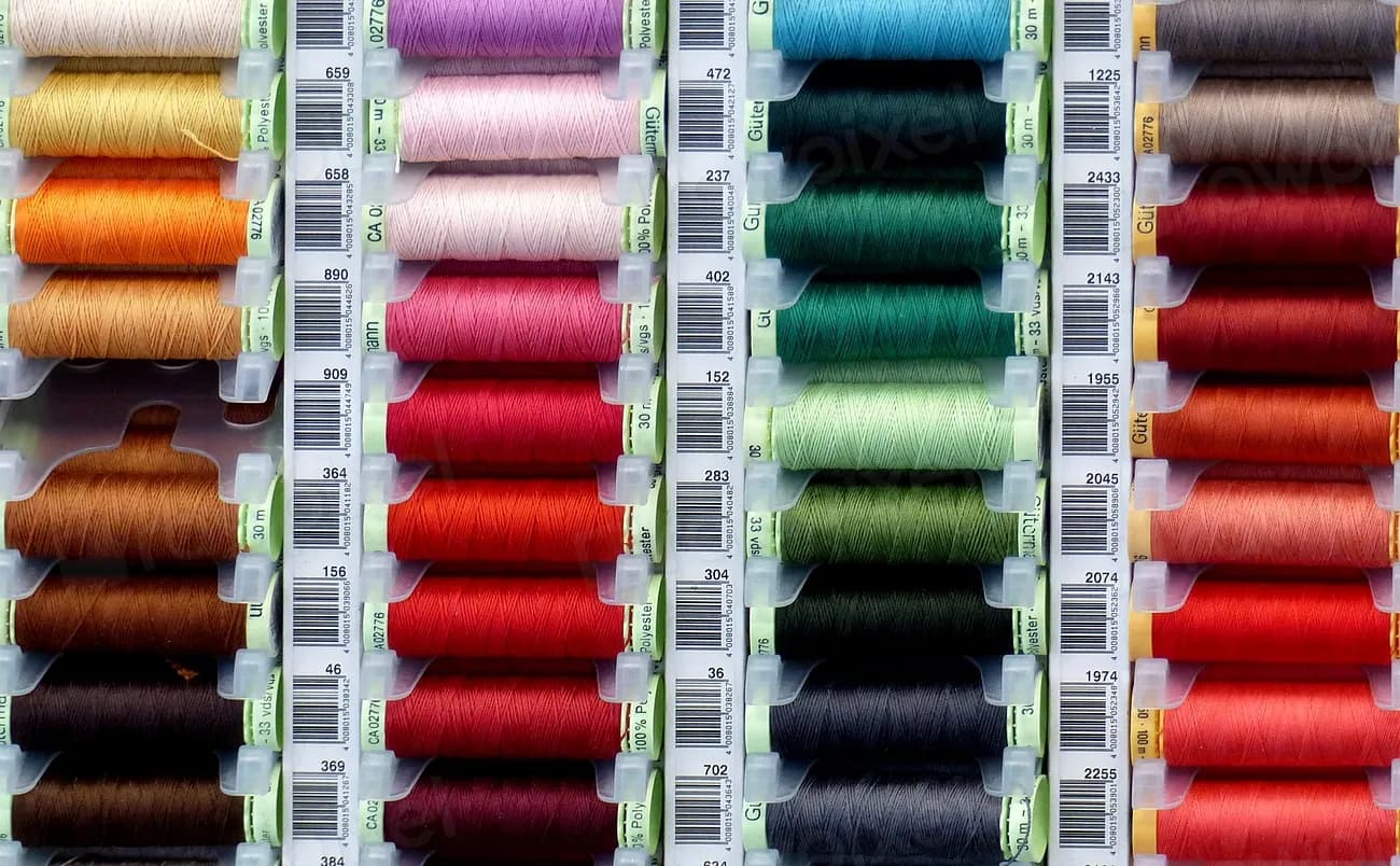 Rows of colored thread spools